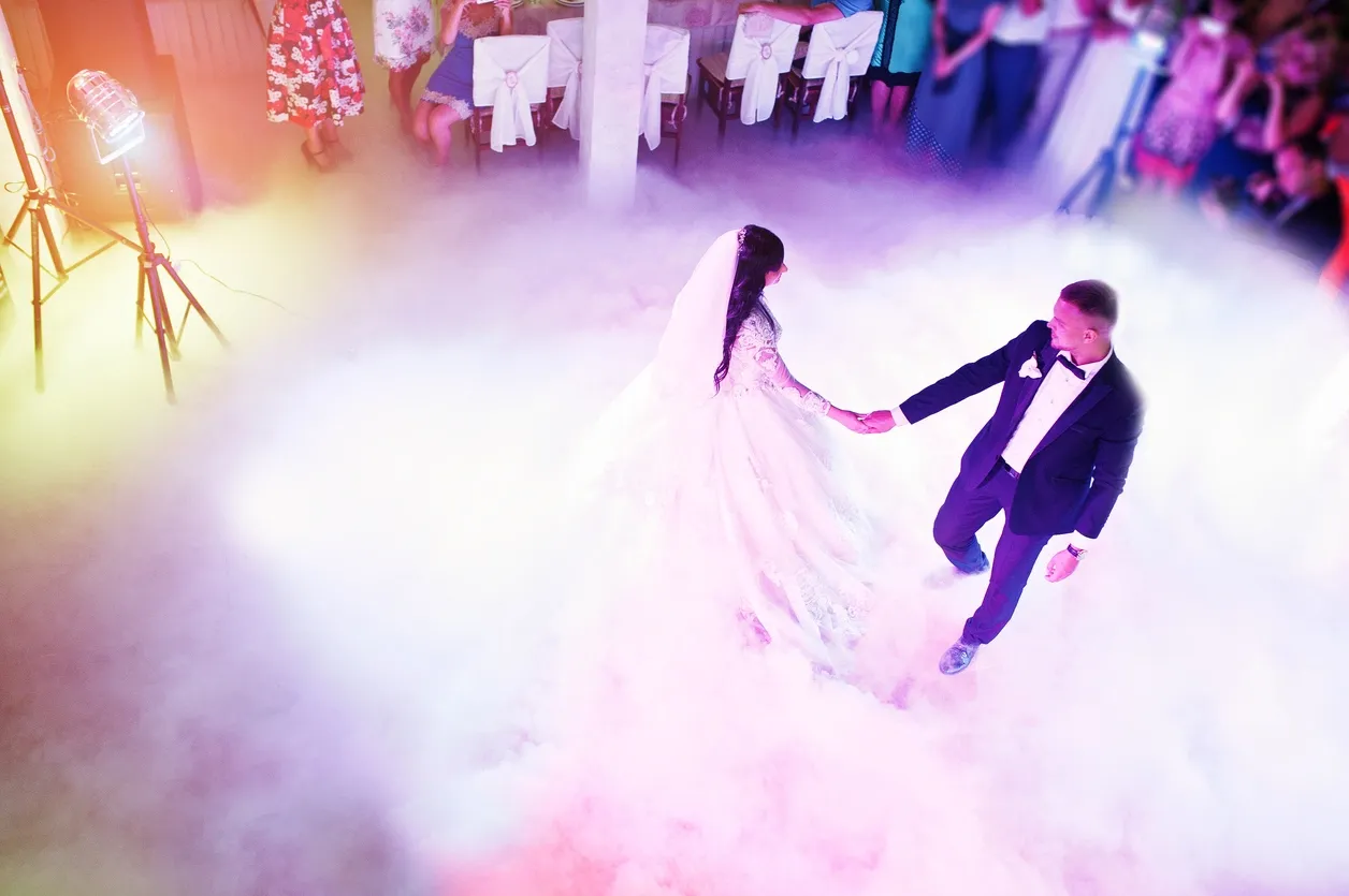 Bride and groom sharing their first dance at their wedding reception.