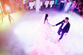 Wedding Couple's Frist Dance with dancing on the clouds fog effect